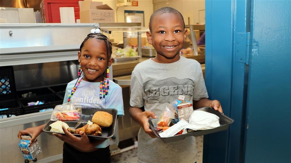 Children at Woodhill Elementary enjoying lunch.